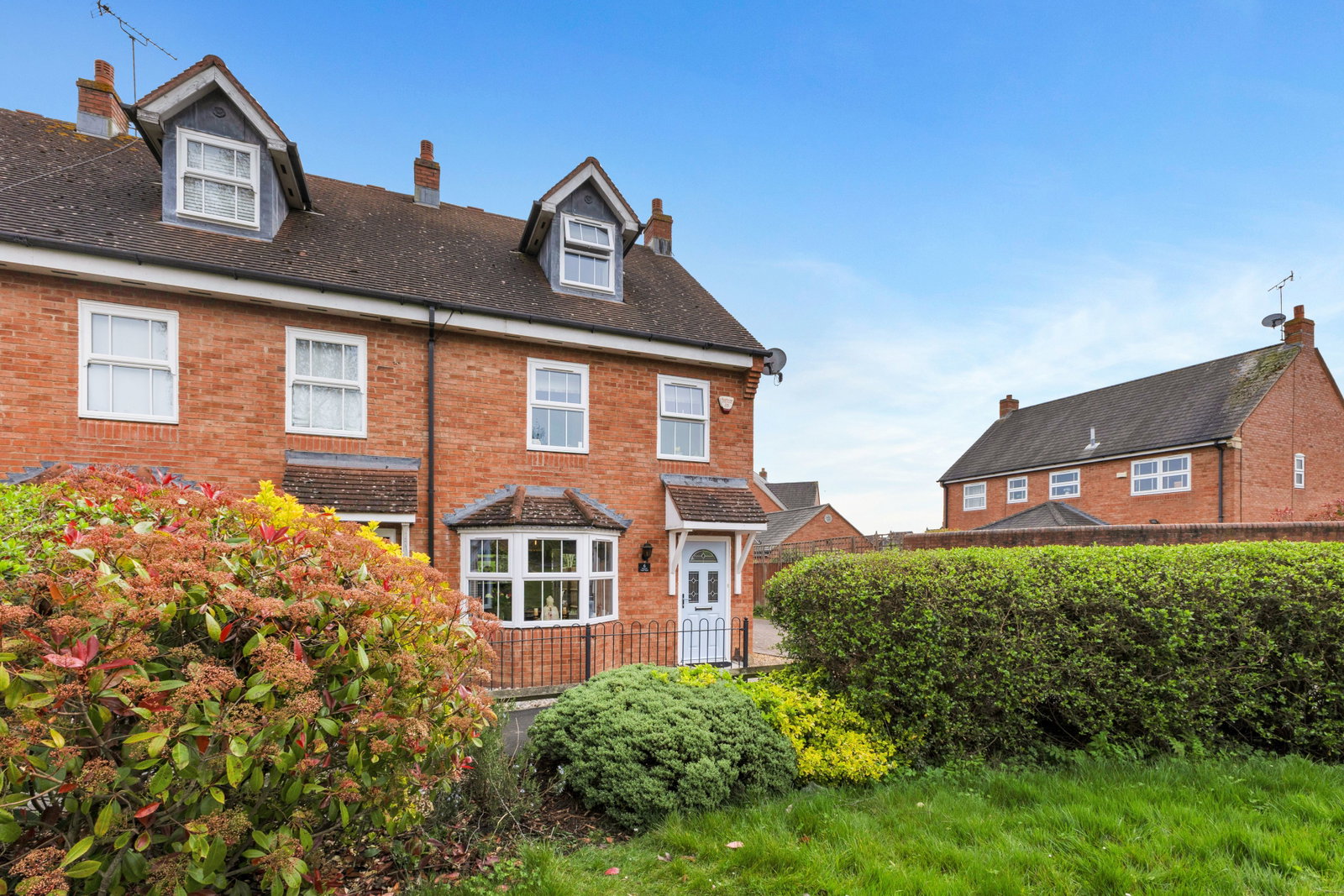 Front of the terraced house at Warren End with an open green outlook